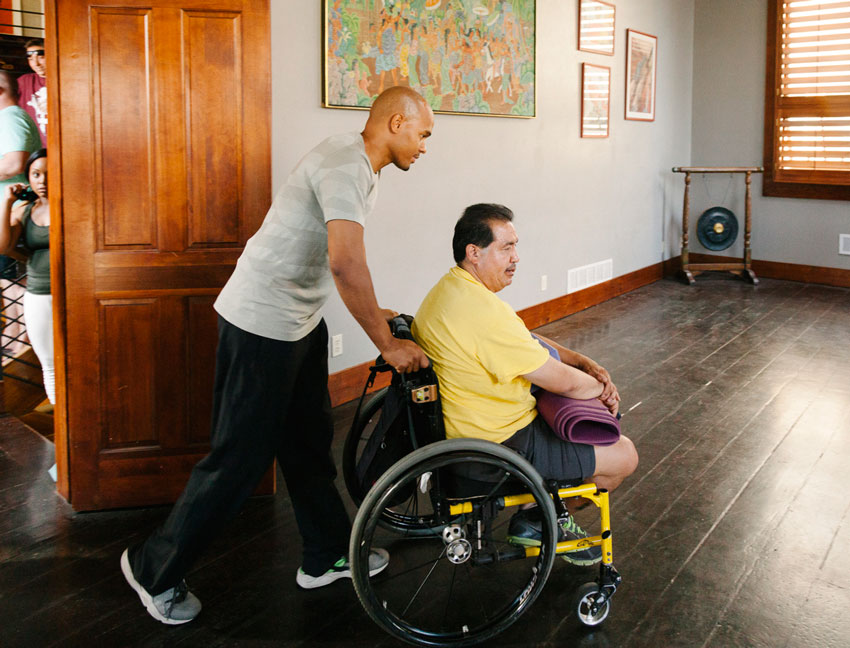 Person in wheelchair about to do yoga